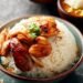 Arroz de Frango de Cingapura: O Prato Nacional Aromático e Saboroso 10 Arroz de Frango de Cingapura: O Prato Nacional Aromático e Saboroso